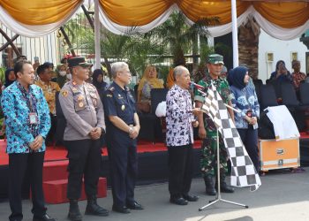 Peringati HJT ke 730, Satpol – PP Tuban Sosialisasikan Gerakan Gempur Rokok Ilegal dengan Festival Drumband
