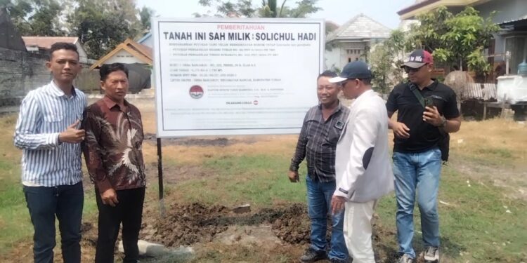 Papan Pemberitahuan Tegas Terpasang di Banjarjo: Tanah Seluas 1.730 Meter Persegi Diklaim Sah Milik Solichul Hadi Berdasarkan Putusan Pengadilan